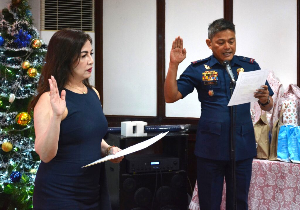 MPIF President Melody Del Rosario making her pledge as part of the PNP Maritime Advisory Group Council for Police Transformation and Development